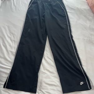 Black Nike warmup pants